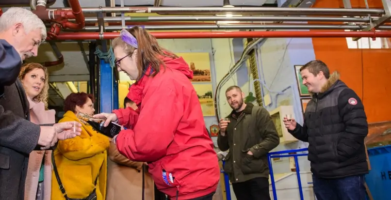 Guests on a brewery tour at Batemans