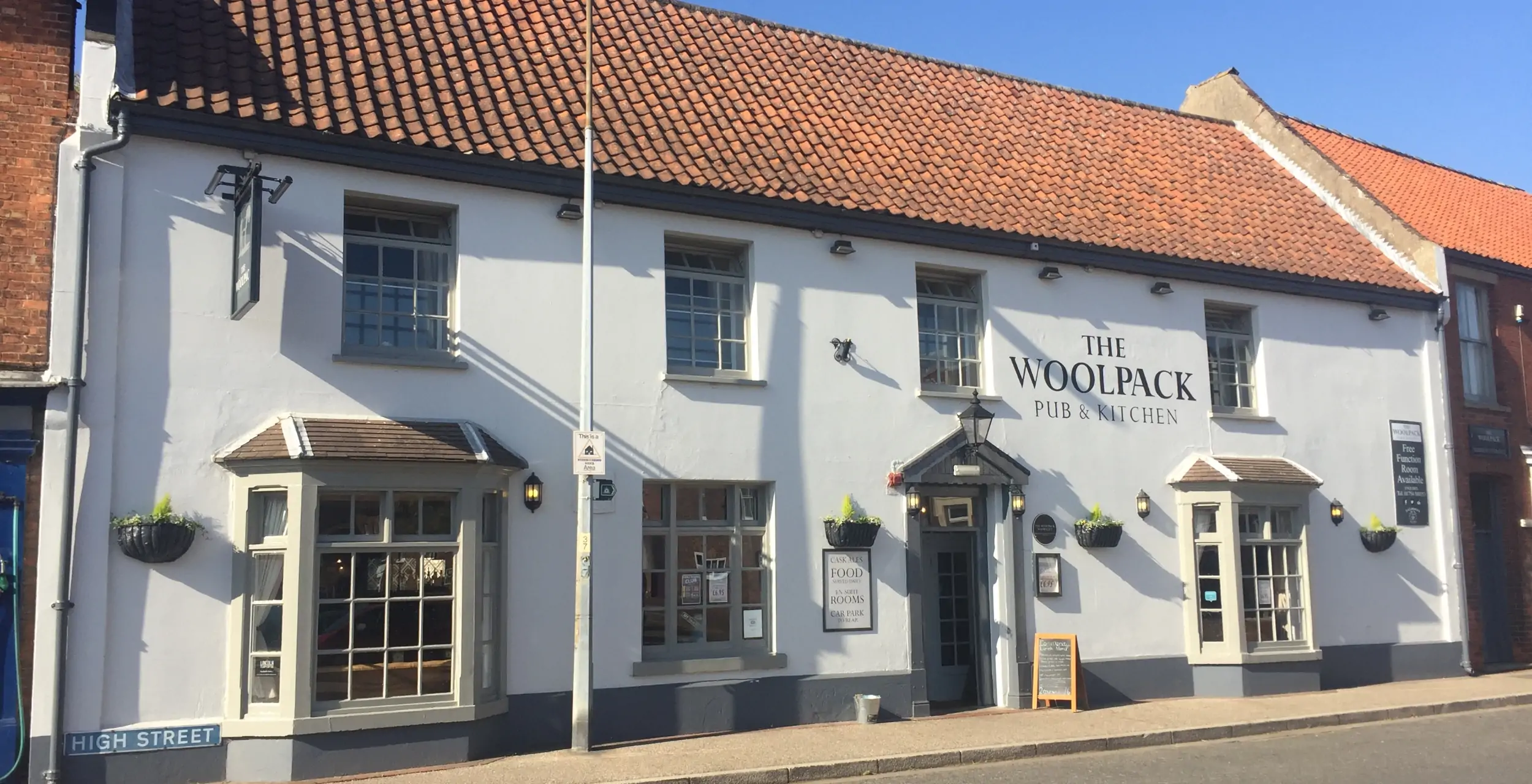 The front exterior of the Woolpack Pub & Kitchen