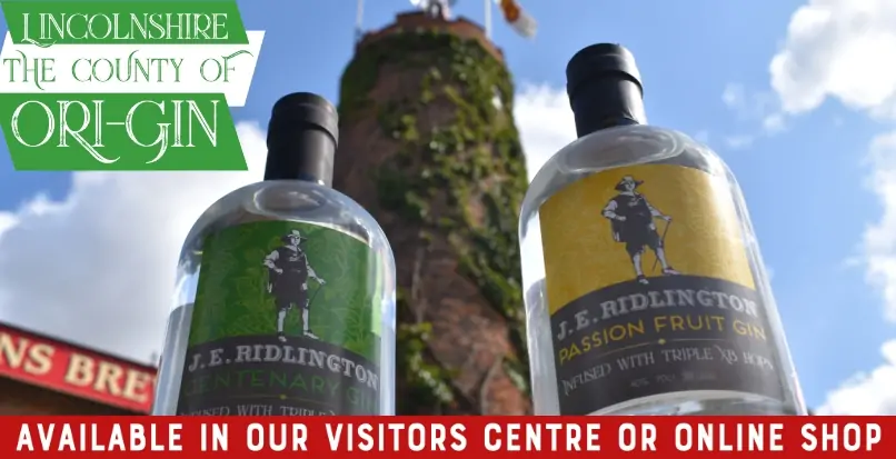 J.E. Ridlington gin bottles in front of the Batemans' windmill