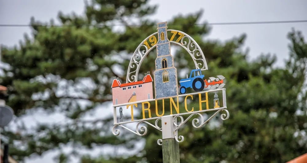 Batemans Pub - Crown Inn, Trunch - Village Sign
