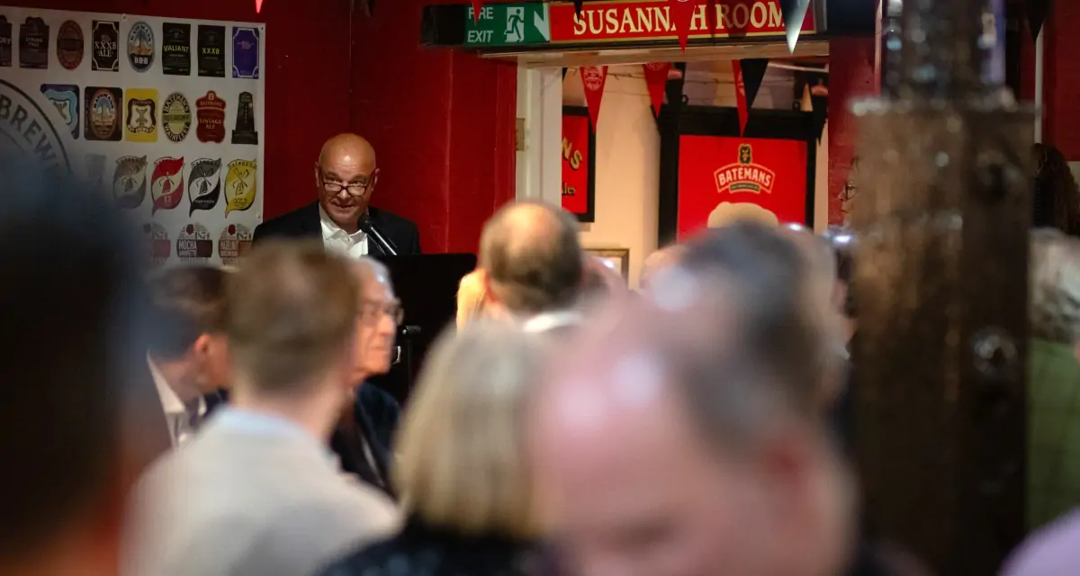 Batemans celebrate 150th anniversary with Brewers lunch - Stuart Bateman with guests looking on and enjoying the speeches.