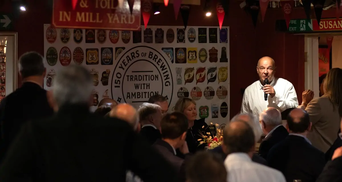 Batemans celebrate 150th anniversary with Brewers lunch - Stuart Bateman with guests looking on enjoying the day.
