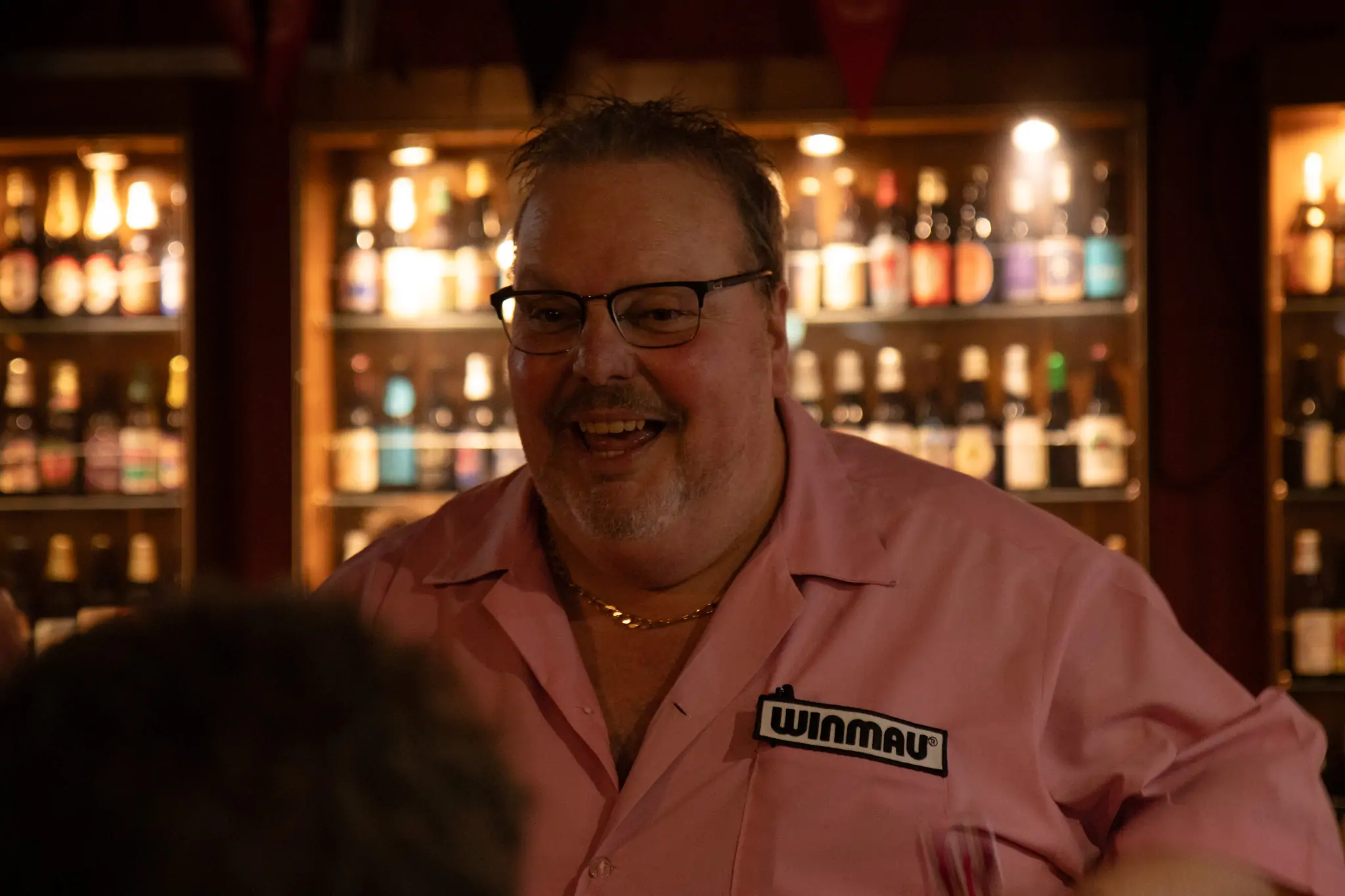 Peter Manley Pro Darts Player at the Batemans 150th anniversary celebrations darts competition enjoying a bit of banter with the crowd.