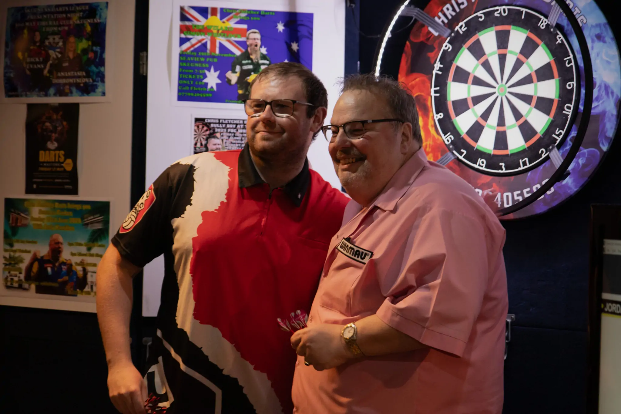 Peter Manley Pro Darts Player at the Batemans 150th anniversary celebrations darts with winner Jordan Chambers.