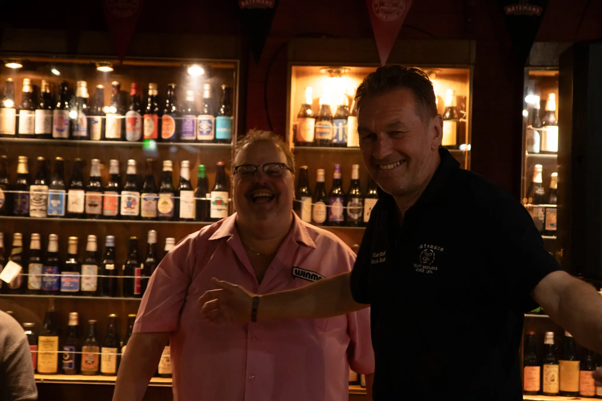 Peter Manley Pro Darts Player at the Batemans 150th anniversary celebrations darts with one of the competitors Miles Hartley.