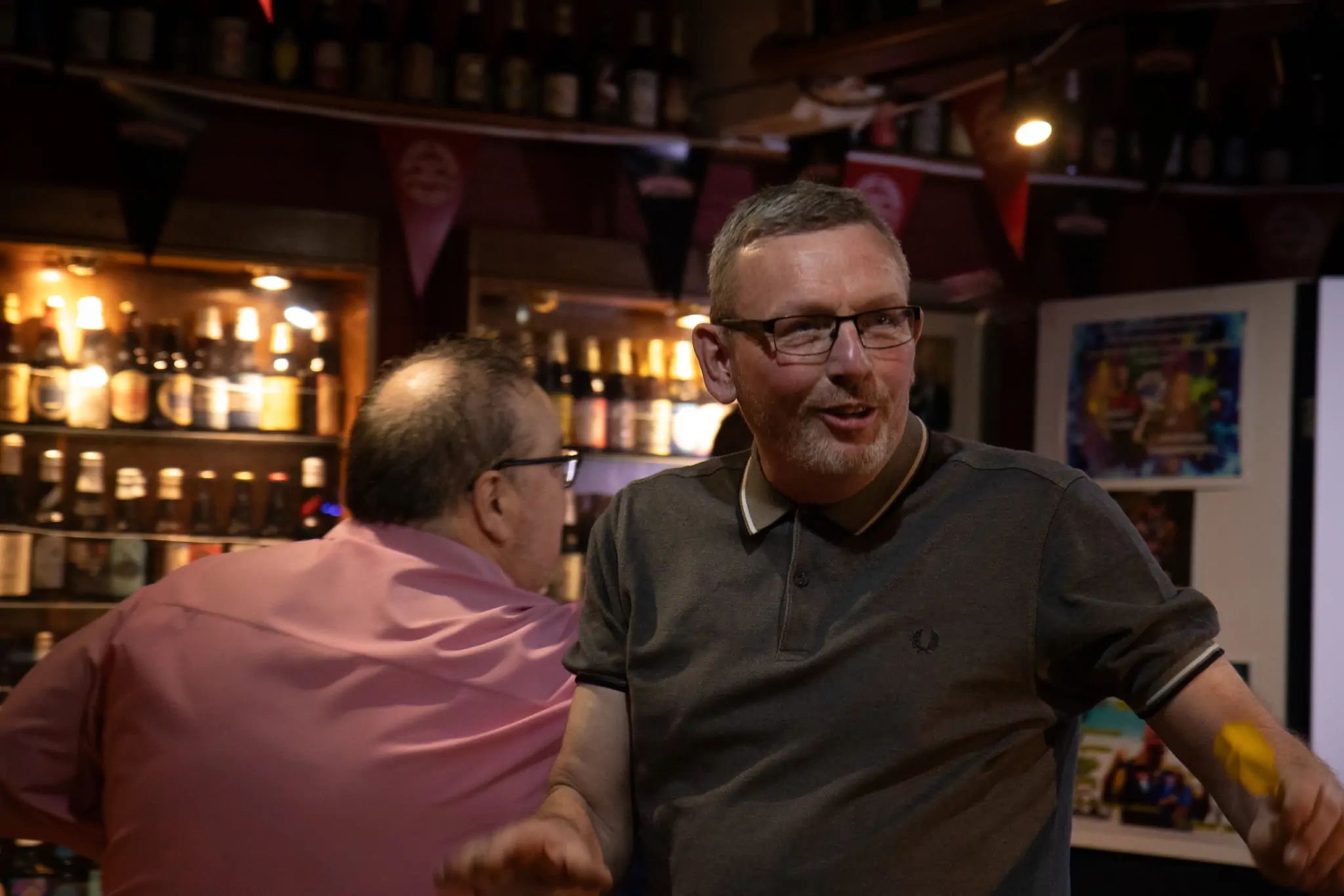 Peter Manley Pro Darts Player at the Batemans 150th anniversary celebrations darts with one of the competitors Martin Bell.