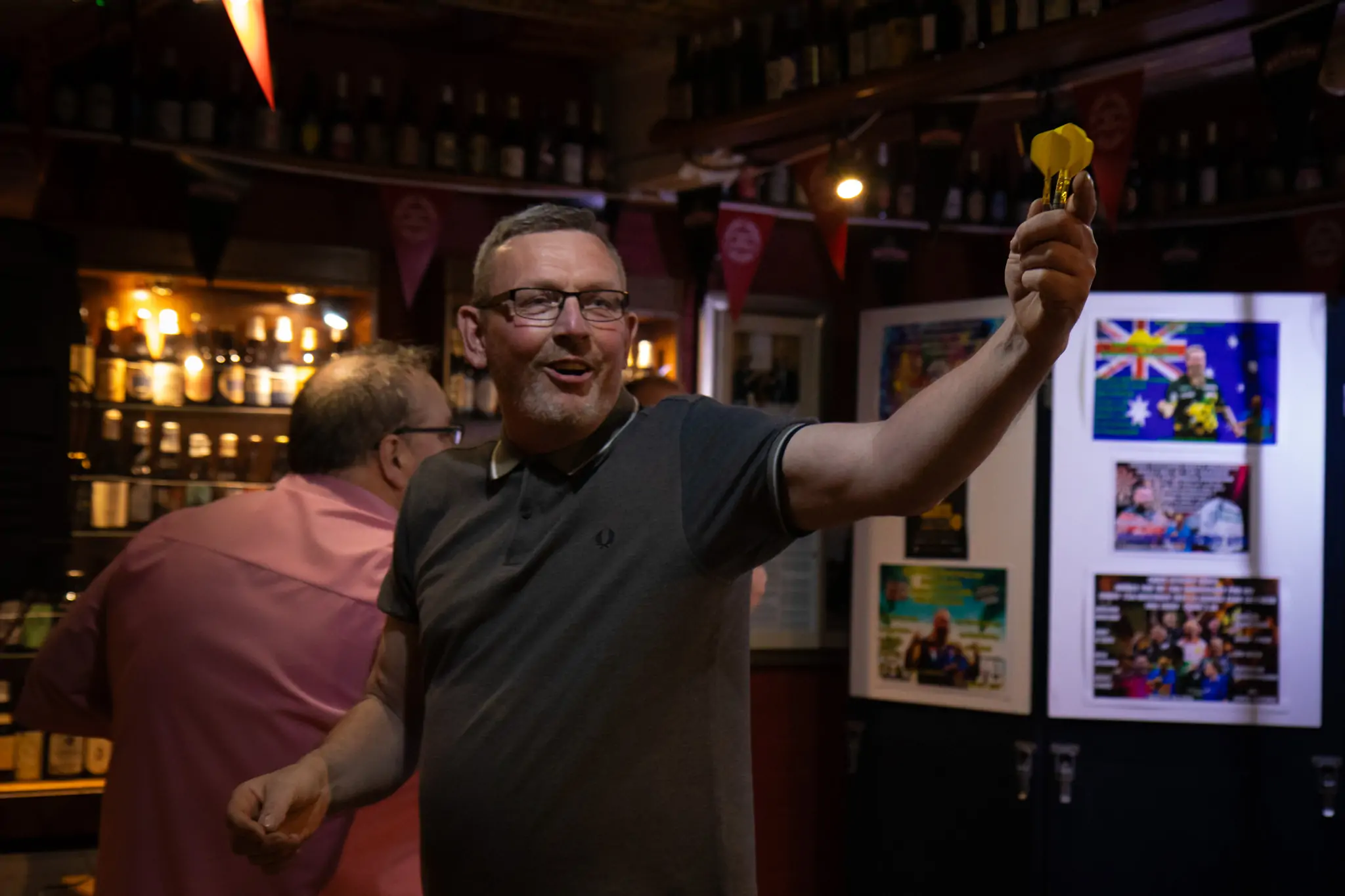Peter Manley Pro Darts Player at the Batemans 150th anniversary celebrations darts with one of the competitors Martin Bell.