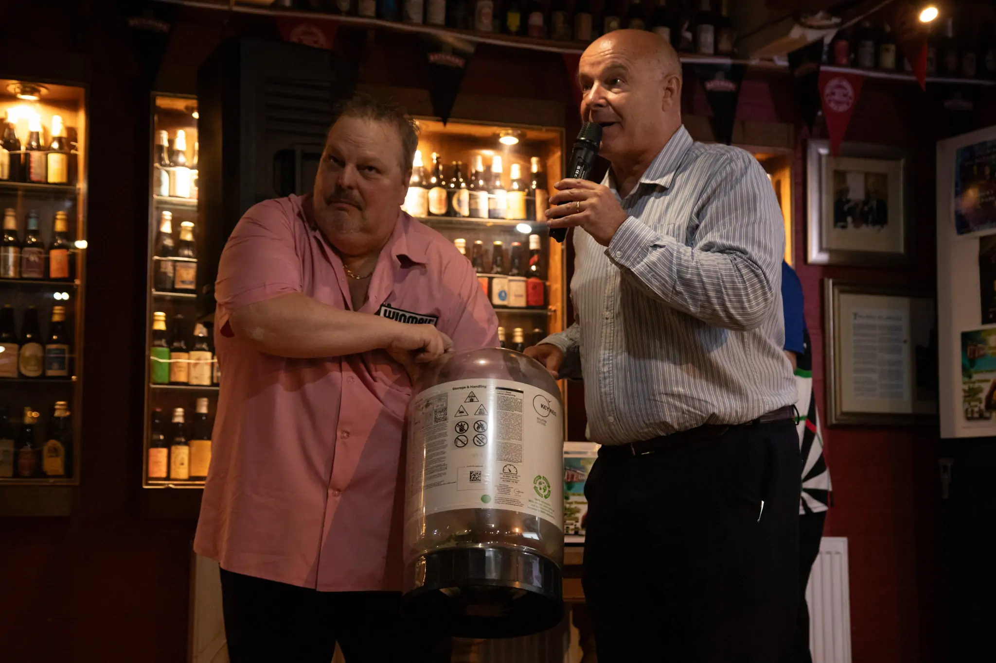 Peter Manley Pro Darts Player at the Batemans 150th anniversary celebrations darts - Stuart Bateman on the Microphone with Peter Manley drawing the Raffle.