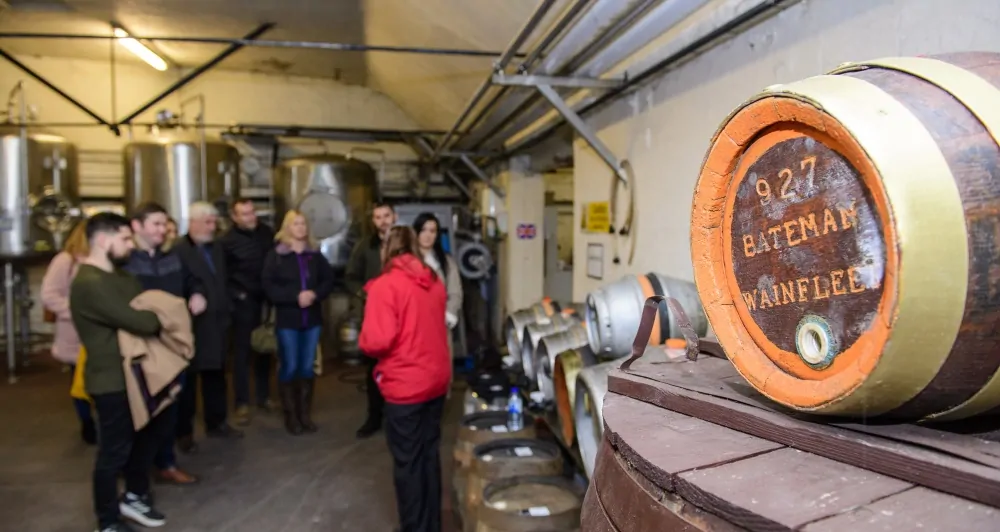 Batemans Brewery Tour - Group in Cask Cellars