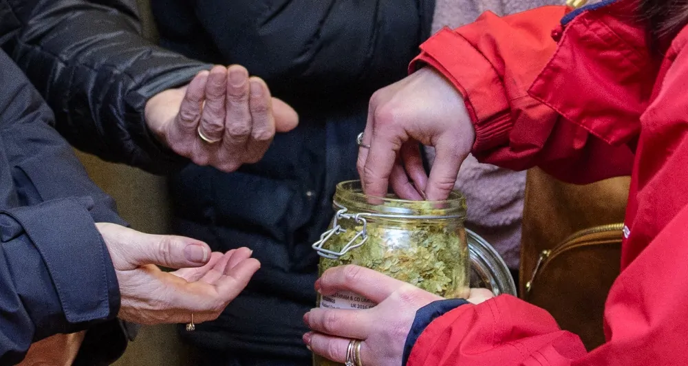 Batemans Brewery Tour - Handing out Hops