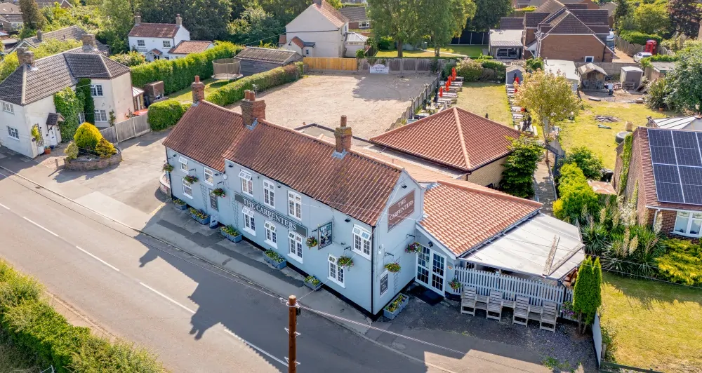Batemans Pub - Carpenters Arms, Fiskerton - Pub Exterior Drone Photo